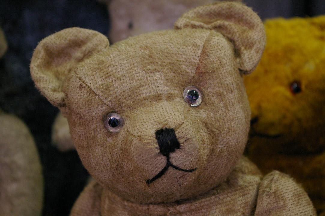 Ancien ours vintage en peluche garni de paille de 55cm à restaurer