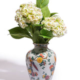 Vase blanc en céramique à motifs floraux et oiseau tropical