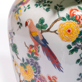 Vase blanc en céramique à motifs floraux et oiseau tropical