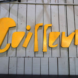 Old metal hairdresser sign