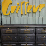 Old metal hairdresser sign