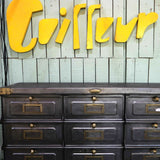 Old metal hairdresser sign