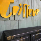 Old metal hairdresser sign