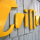 Old metal hairdresser sign