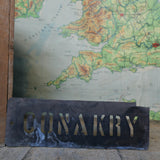 old stencil marking for museum crate transport / Conakry