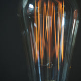 ampoule COMETTE 56  filament de carbonne facon Thomas Edison neuve