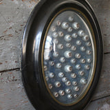 Napoleon III globe frame decorated with antique mechanical doll eyes