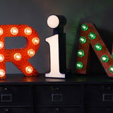 very large letter R from an old illuminated fairground sign