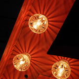 tres grande lettre A d'ancienne enseigne lumineuse façon fete foraine