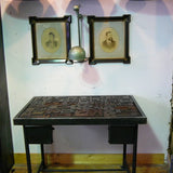 Industrial desk table with printed characters on top