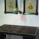 Industrial desk table with printed characters on top