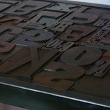 Industrial desk table with printed characters on top