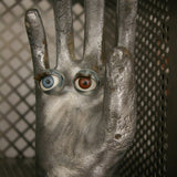 An industrial mold reimagined with doll's eyes
