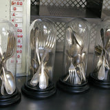 Globe decor of antique silver-plated metal cutlery