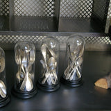 Globe decor of antique silver-plated metal cutlery