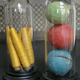 Globe decor of an antique toy/croquet set