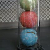 Globe decor of an antique toy/croquet set