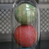 Globe decor of an antique toy/croquet set