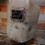 curiosité ancien masque de soudeur sur socle