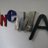 word composed of old letters, sign CINEMA