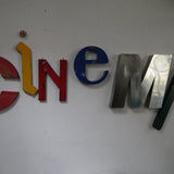 word composed of old letters, sign CINEMA