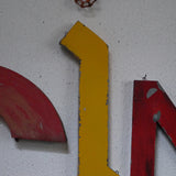 word composed of old letters, sign CINEMA