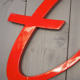 old zinc sign with the word "caterer" in bright red