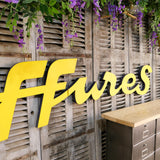 Former large metal hair salon sign