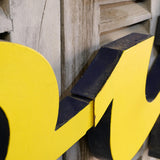 Former large metal hair salon sign