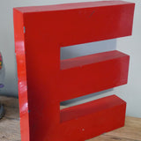 large red letter E from an old sign
