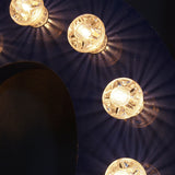 tres grande lettre E d'ancienne enseigne lumineuse façon fete foraine