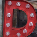 tres grande lettre R d'ancienne enseigne lumineuse façon fete foraine