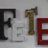 mot composé d'ancienne lettre enseigne FETE