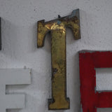 mot composé d'ancienne lettre enseigne FETE