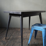 La célèbre table 55 Tolix patine graphite