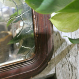 antique mirror with wooden frame