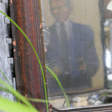 antique mirror with wooden frame