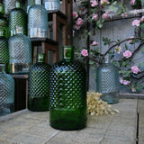 Recycled glass bottle with fir green spikes