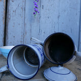 antique enameled coffee pot with blue checkered decoration