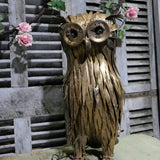 Large metal owl with light-up eyes