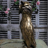 Large metal owl with light-up eyes