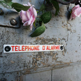 Old enamel alarm telephone sign