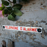 Old enamel alarm telephone sign