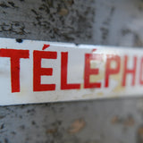 Old enamel alarm telephone sign