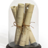 Dôme en verre / cloche avec rouleaux de papier sur socle noir