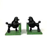 Paire de serre-livres en fonte patinée noire à motif caniche