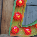 very large letter E from an old illuminated fairground sign