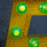 very large letter E from an old illuminated fairground sign