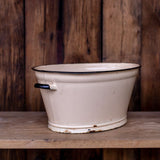 old pastel pink enamel basin