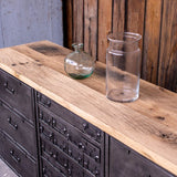 Military-style console table with metal frame, wooden top, and 26 drawers